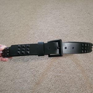 Black studded belt, Size Medium, measures to 39 inches in length.